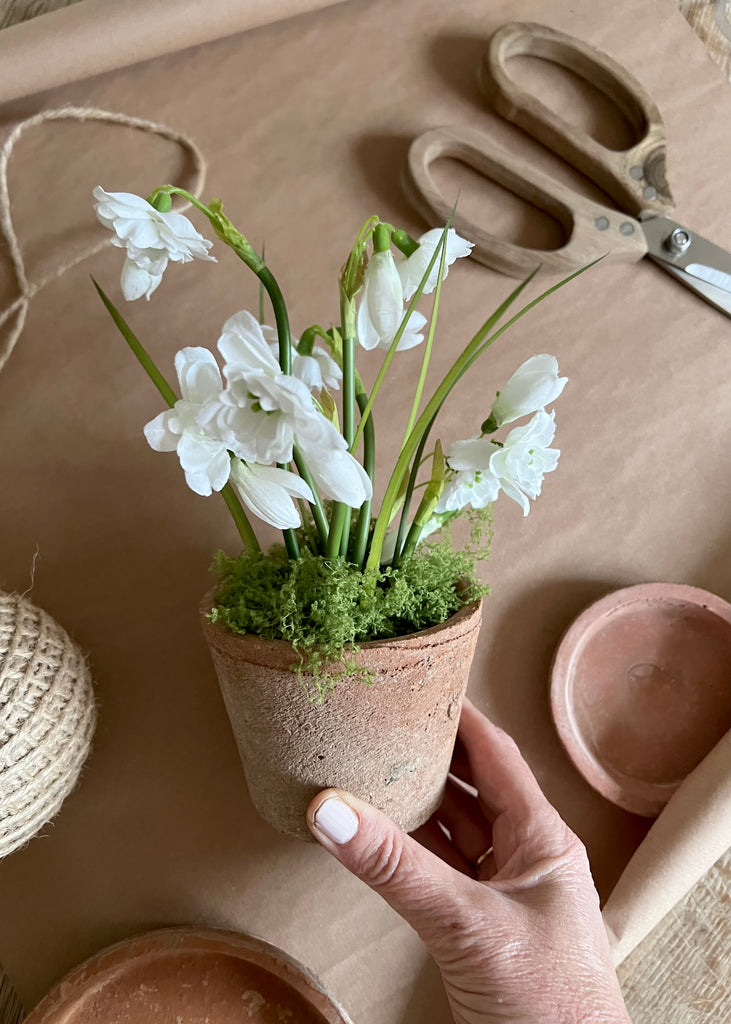 Faux Snowdrops In  Small Terracotta Pot.