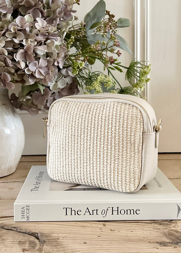 The Maria Leather & Raffia Crossbody Bag.  Cream