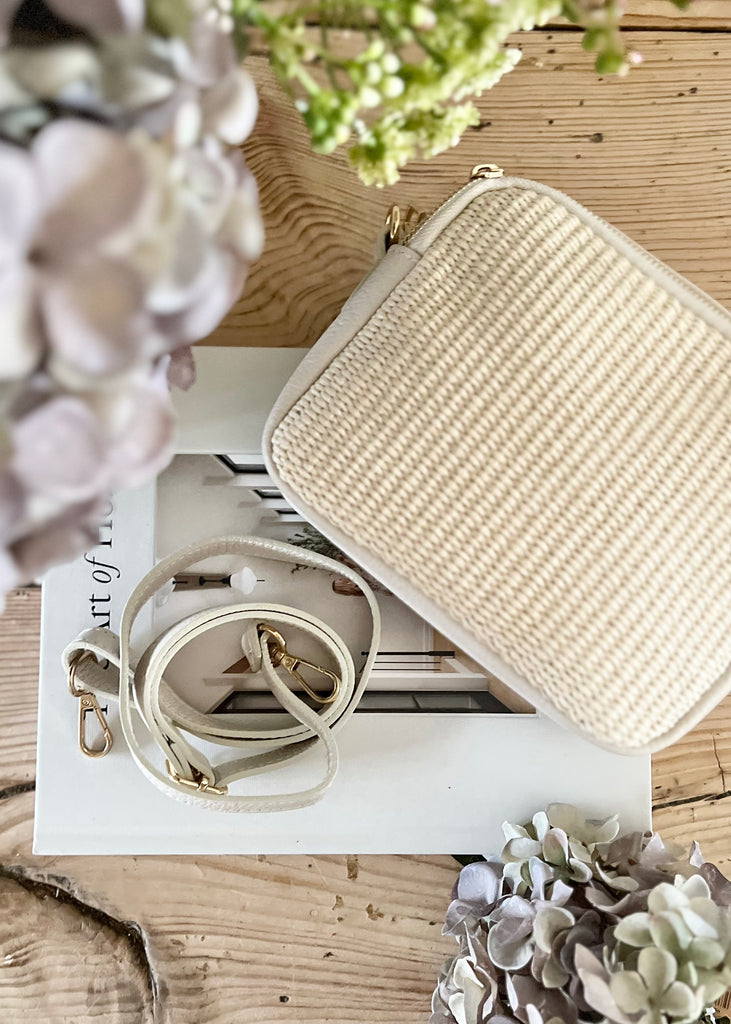 The Maria Leather & Raffia Crossbody Bag.  Cream